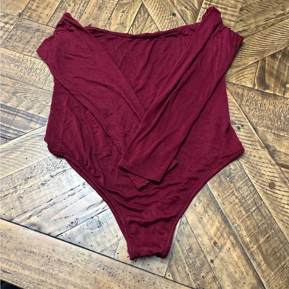 NWOT bodysuit. Perfect condition. Smoke free home.